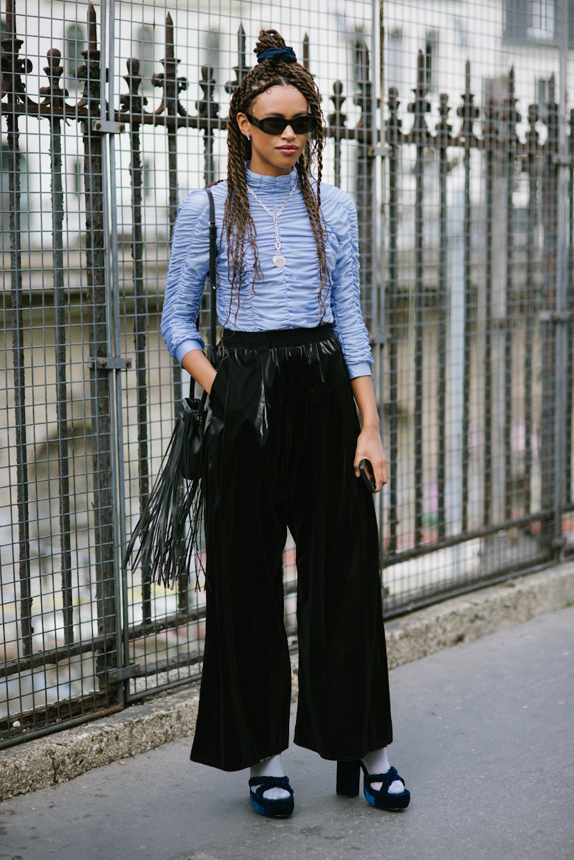 PARIS, FRANCE - SEPTEMBER 28: A guest poses after the Victoria-Tomas show during Paris Fashion Week ...