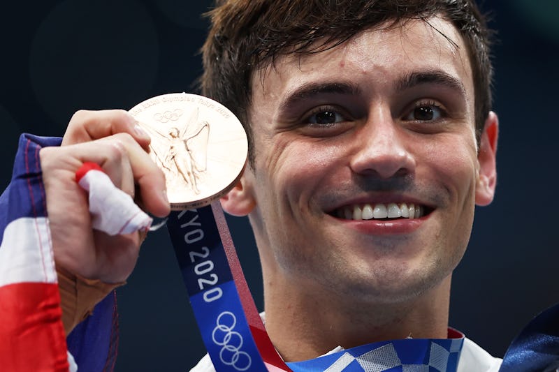 TOKYO, JAPAN - AUGUST 07: Bronze medalist Thomas Daley of Team Great Britain poses after the medal c...