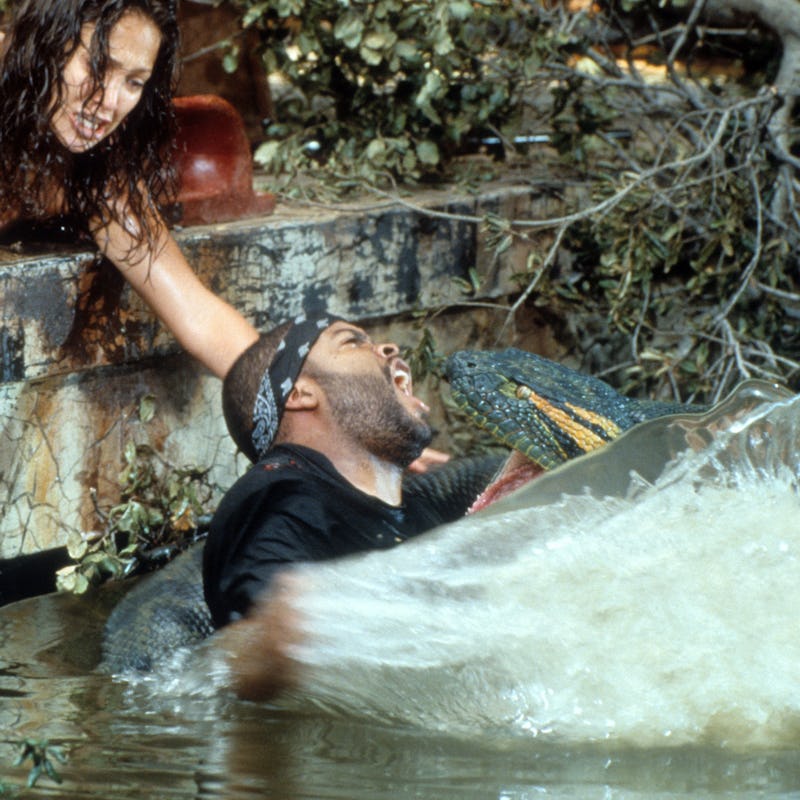 Jennifer Lopez reaching for Ice Cube as he's attacked in a scene from the film 'Anaconda', 1997