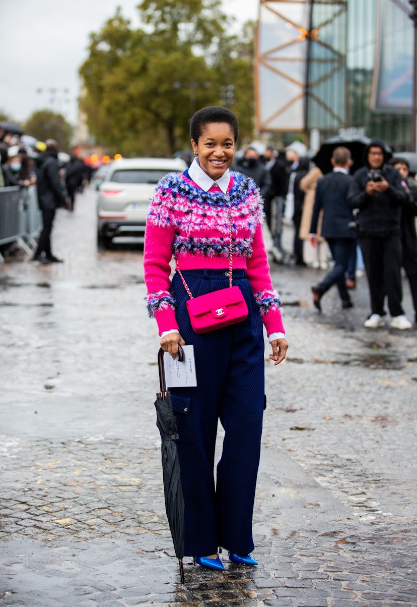 PARIS, FRANCE - OCTOBER 05: Tamu McPherson seen wearing Chanel bag, jumper, navy pants outside Chane...
