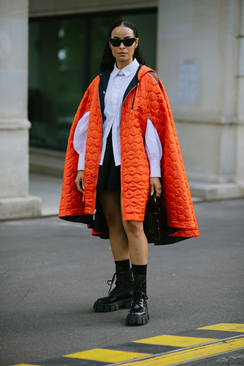 PARIS, FRANCE - SEPTEMBER 28: A guest poses wearing a Koche coat after the Koche show at the Shangri...