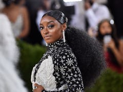 Simone Biles attends 2021 Costume Institute Benefit. On Oct. 5, she tweeted support for soccer playe...