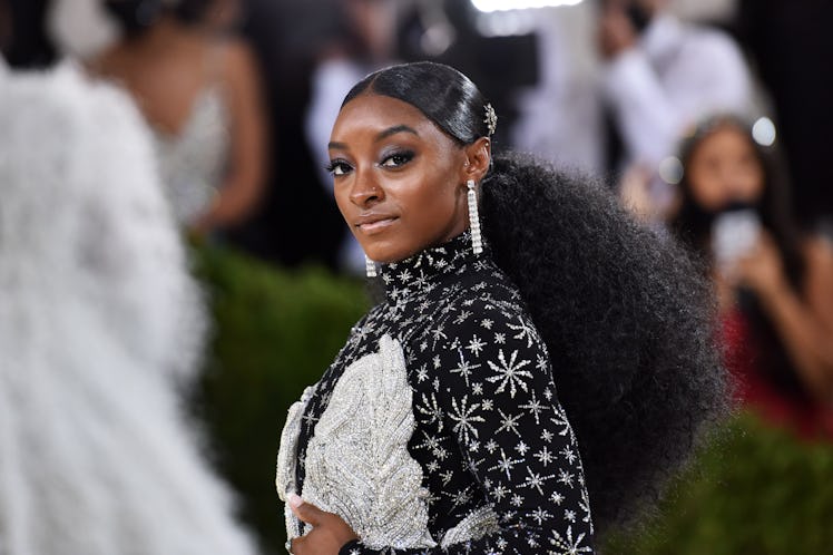 Simone Biles attends 2021 Costume Institute Benefit. On Oct. 5, she tweeted support for soccer playe...