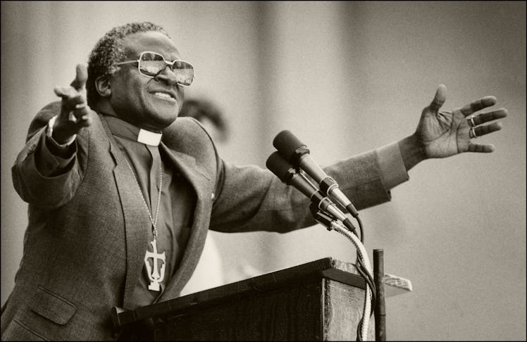 South African religious leader and activist Bishop Desmond Tutu  gestures as he gives a speech at th...