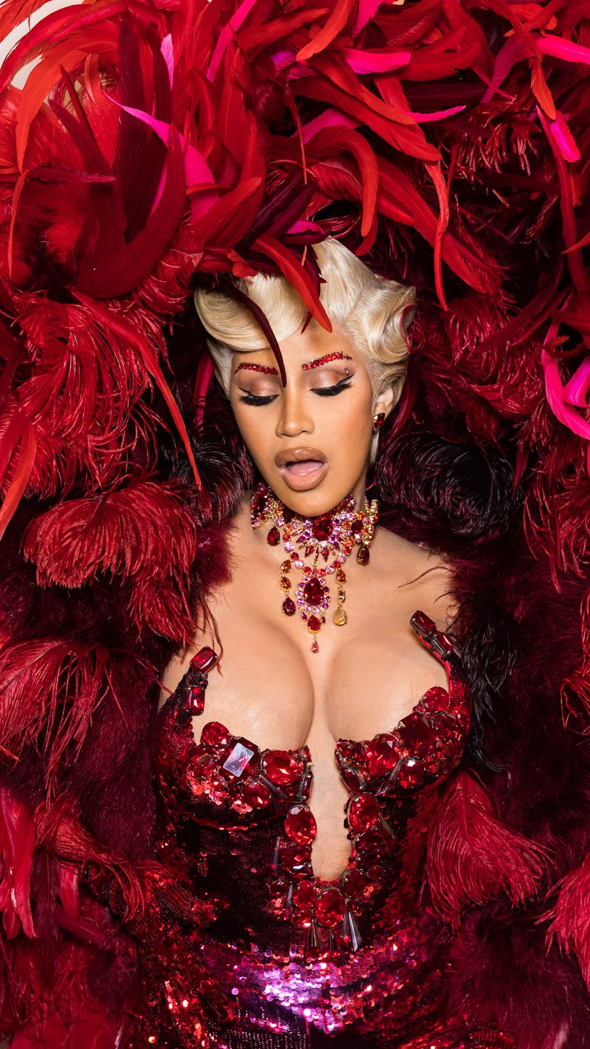 Cardi B's Paris Fashion Week 2021 looks made her the MVP at the front row. From feathers to breastpl...