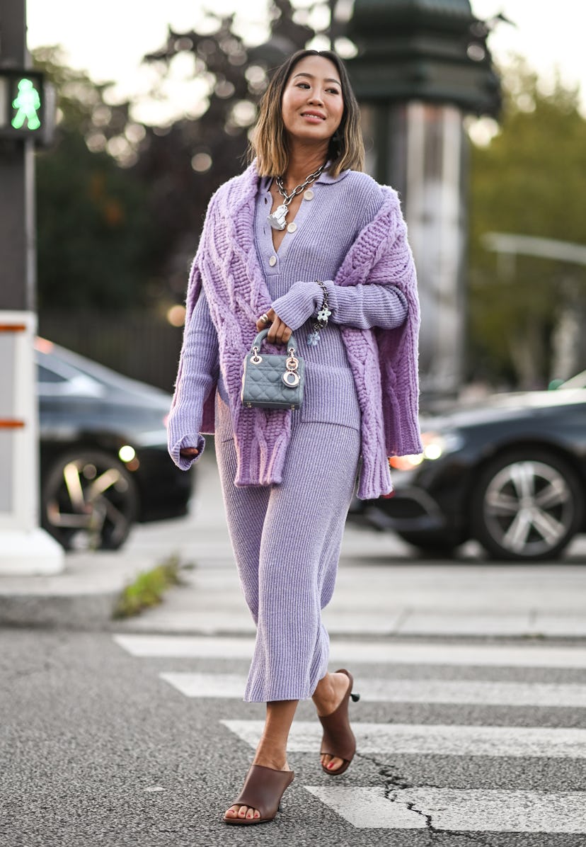 PARIS, FRANCE - SEPTEMBER 29:  Aimee Song is seen wearing a purple Acne outfit outside the Acne show...