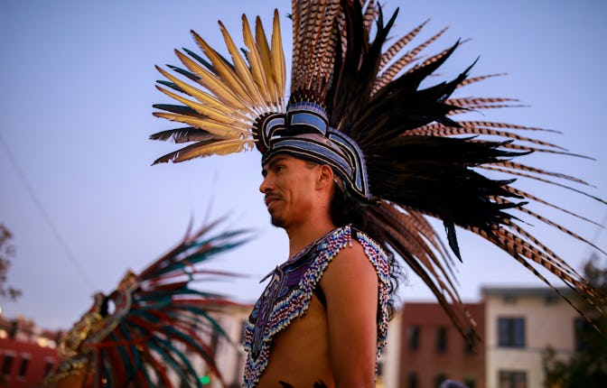 BLOOMINGTON, INDIANA, UNITED STATES - 2019/10/14: Mexica (Aztec) dancer, Alejandro Quintana, of Indi...