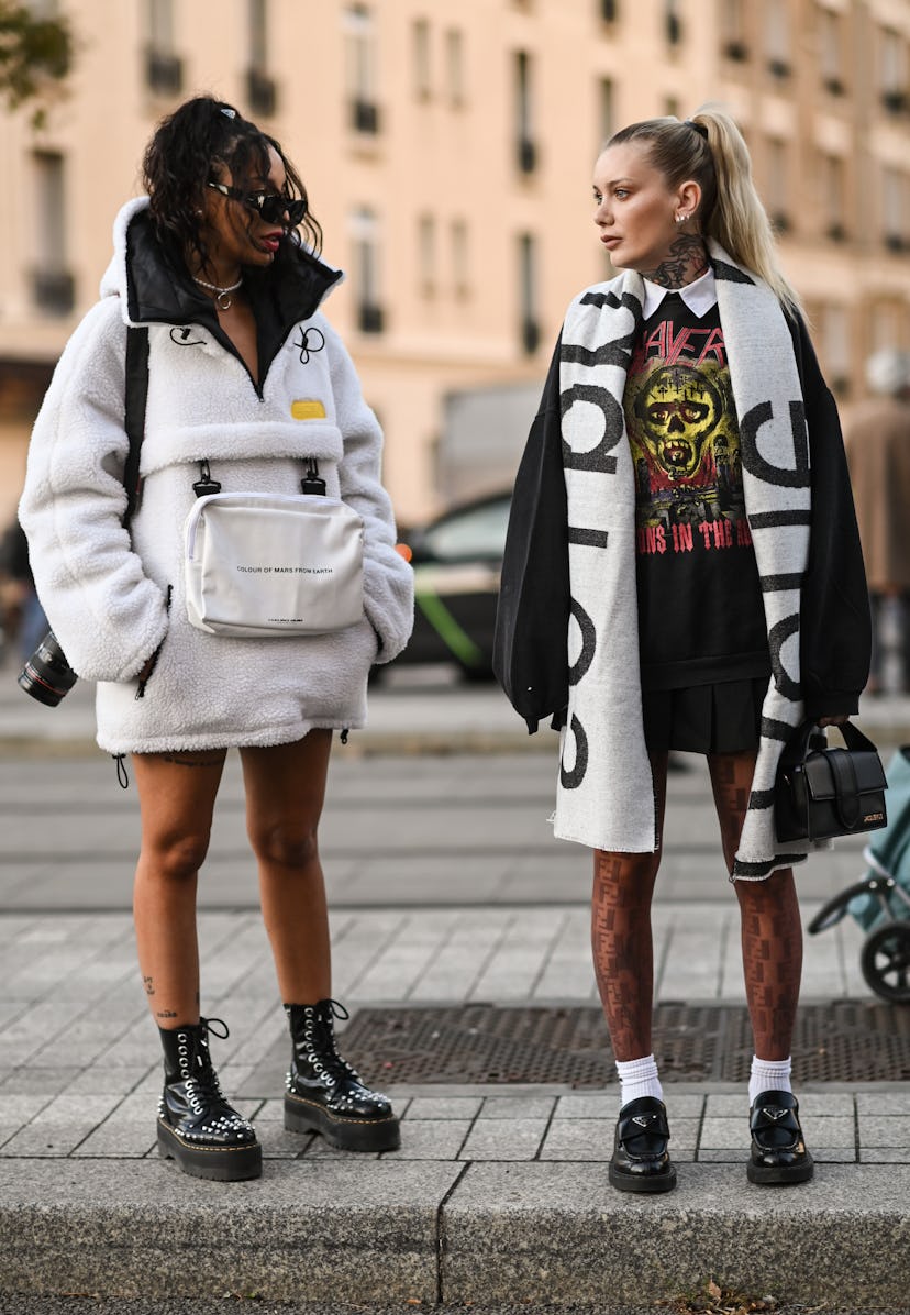 PARIS, FRANCE - SEPTEMBER 29:  Guests seen outside the Acne show during Paris Fashion Week S/S 2022 ...