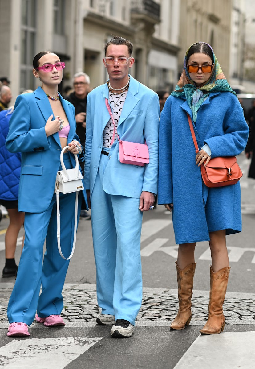PARIS, FRANCE - OCTOBER 02: Guests seen wearing blue outfits outside the Vivienne Westwood show duri...