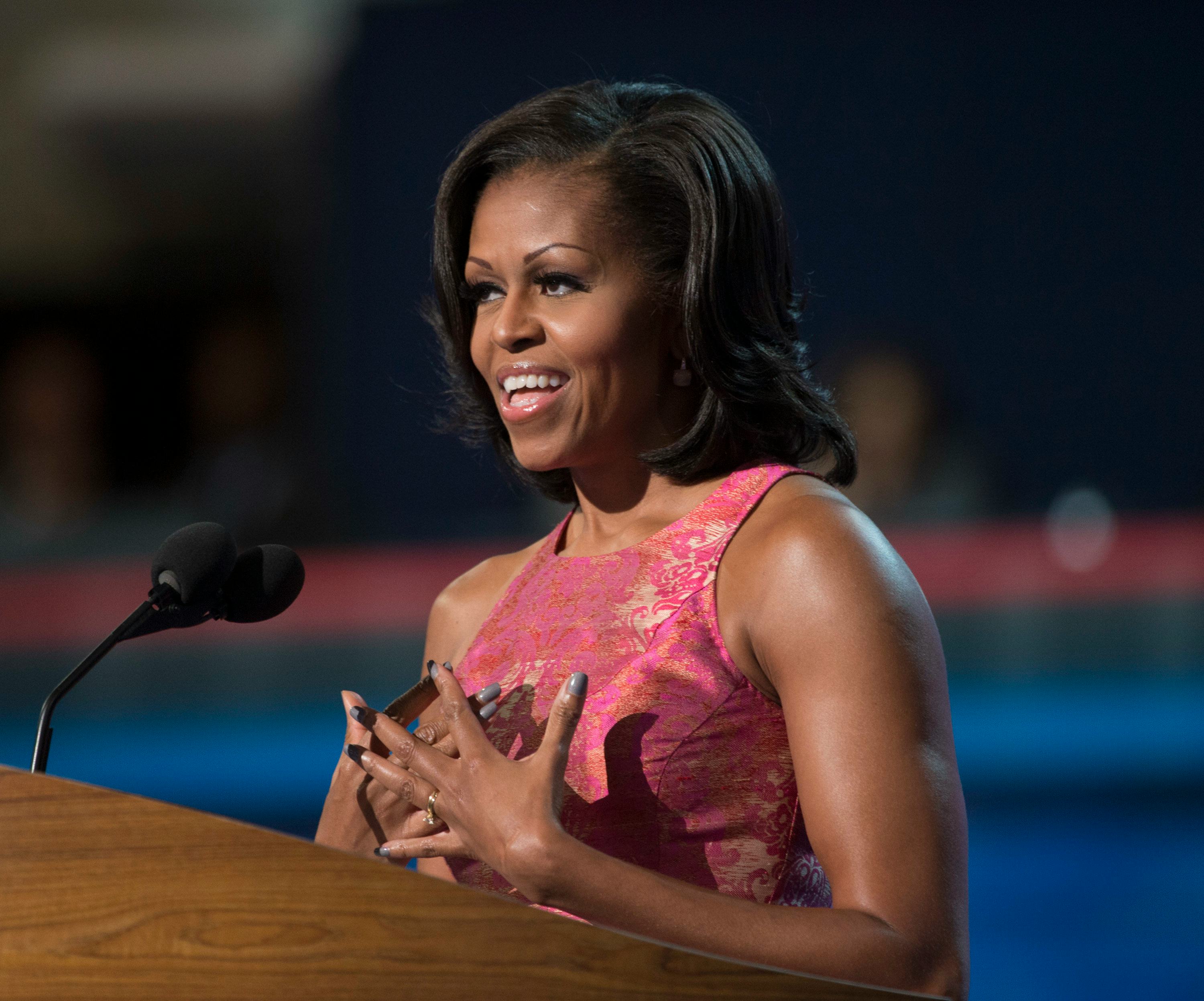 First Lady Michelle Obama speaks to the democratic delegates at the Time Warner Cable Arena during t...