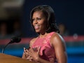 First Lady Michelle Obama speaks to the democratic delegates at the Time Warner Cable Arena during t...