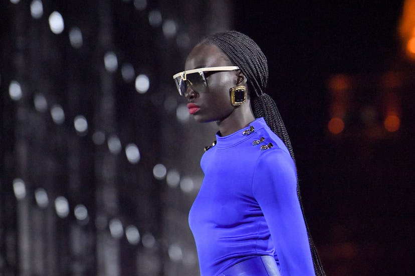 A model walks the runway during the Saint Laurent Womenswear Spring/Summer 2022 show as part of Pari...