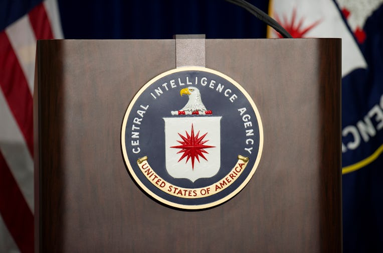 The lectern stands empty as reporters await the arrival of Director of Central Intelligence Agency J...