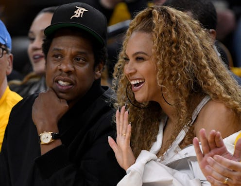 OAKLAND, CA - APRIL 29: Jay-Z and Beyonce sit court side as the Golden State Warriors take on the Ne...