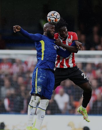 LONDON, ENGLAND - OCTOBER 02: Romelu Lukaku of Chelsea competes for a header with Mohammed Salisu of...