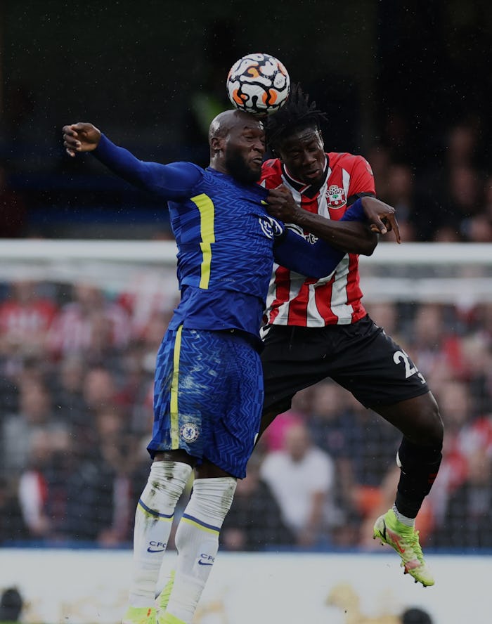 LONDON, ENGLAND - OCTOBER 02: Romelu Lukaku of Chelsea competes for a header with Mohammed Salisu of...