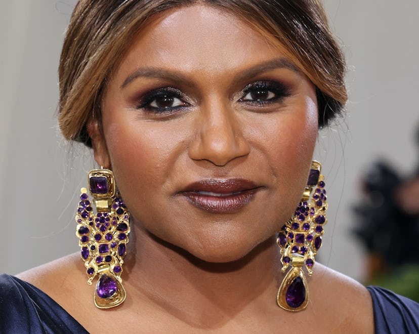 Mindy Kaling's daughter loves her umbrella.