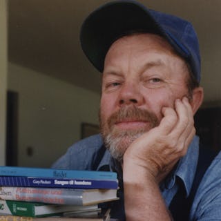 Gary Paulsen, author, is shown with some of his books. Photo is one of several for a feature on Paul...