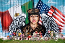 Candles and flowers decorate a makeshift memorial for US Army Specialist Vanessa Guillen at Power Ho...