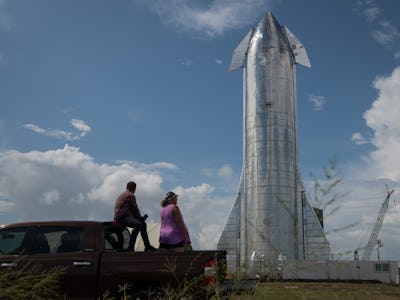 BOCA CHICA, TX - SEPTEMBER 28: Space enthusiasts look at a prototype of SpaceX's Starship spacecraft...