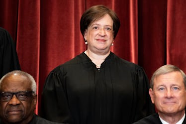 Associate Justice Elena Kagan (C), with Associate Justice Clarence Thomas (L) and Chief Justice John...