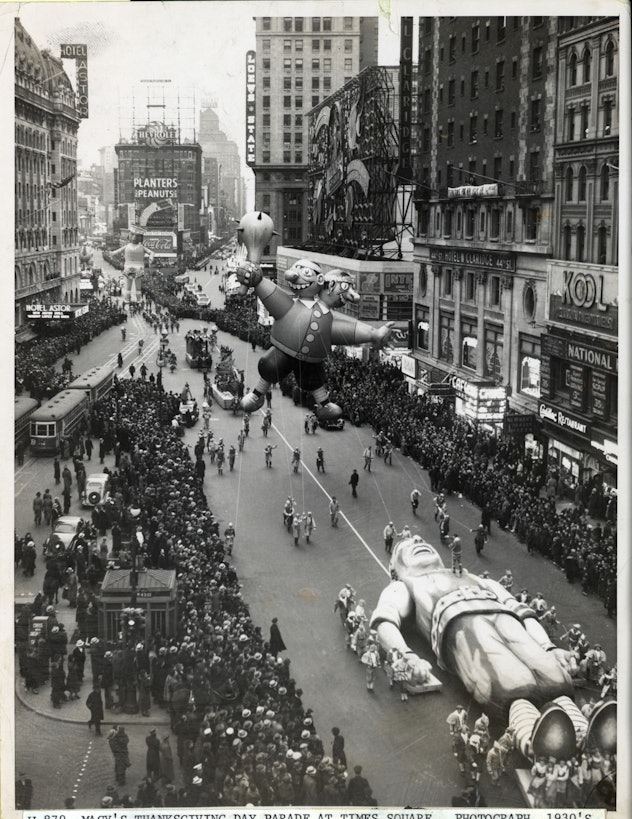 (Original Caption) New York, NY: Macy's Thanksgiving Day Parade at Times Square. Photograph, ca. 193...