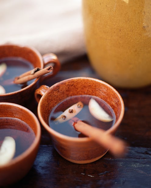 Apple cider with a cinnamon stick. Here are 12 easy ways to improve apple cider.