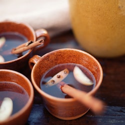 Apple cider with a cinnamon stick. Here are 12 easy ways to improve apple cider.