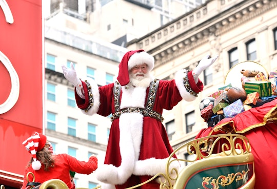 NEW YORK, NEW YORK - NOVEMBER 26: Santa Claus waves from his sleigh float at the 94th Annual Macy's ...