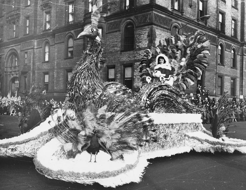 1961:  A peacock float taking part in a Thanksgiving Day Parade in a US city.  (Photo by William Lov...