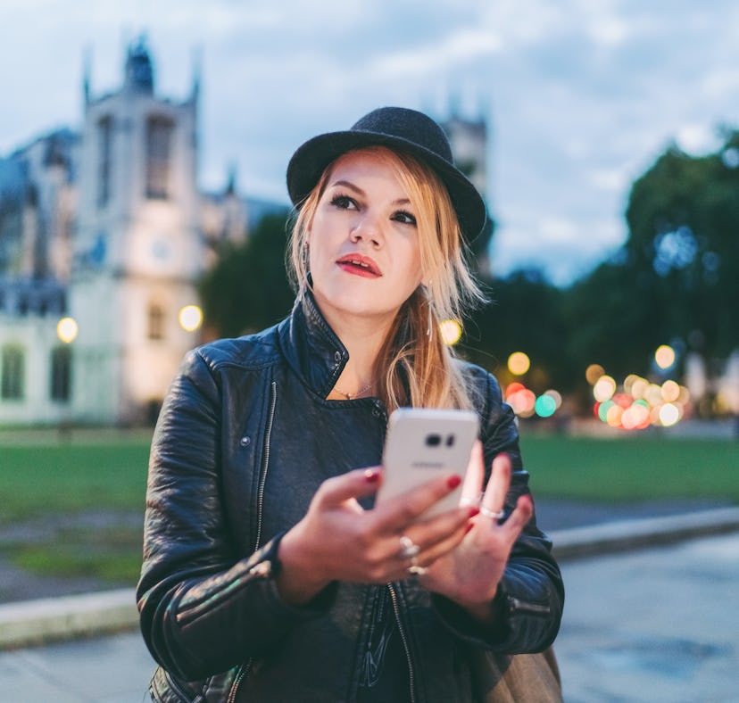 Woman wearing coat in the city, thinking about how December 6, 2021 will be the worst week for her z...