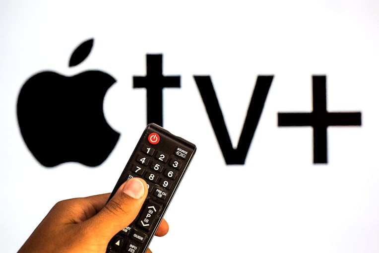 SPAIN - 2021/07/13: In this photo illustration a close-up of a hand holding a TV remote control seen...