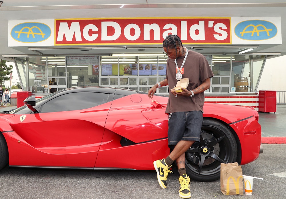 DOWNEY, CALIFORNIA - SEPTEMBER 08:  Travis Scott surprises crew and customers at McDonald's for the ...