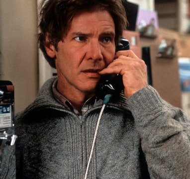 Harrison Ford on pay phone in a scene from the film 'The Fugitive', 1993. (Photo by Warner Brothers/...