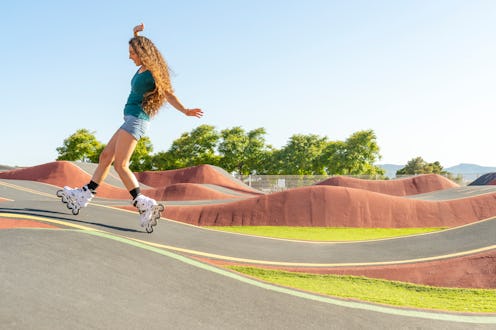 A woman roller blades on a wavy surface. These are the zodiac signs that will be most affected by th...
