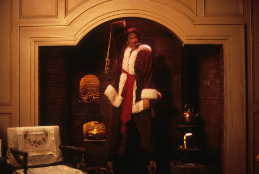 Tim Allen coming down the chimney in a scene from the film 'The Santa Clause', 1994. (Photo by Walt ...