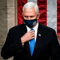 TOPSHOT - Vice President Mike Pence presides over a joint session of Congress to certify the 2020 El...