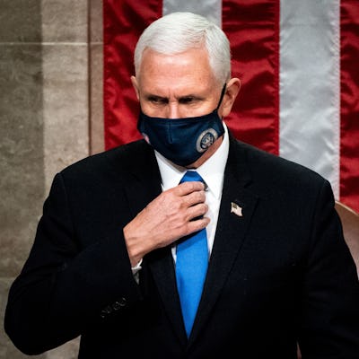 TOPSHOT - Vice President Mike Pence presides over a joint session of Congress to certify the 2020 El...