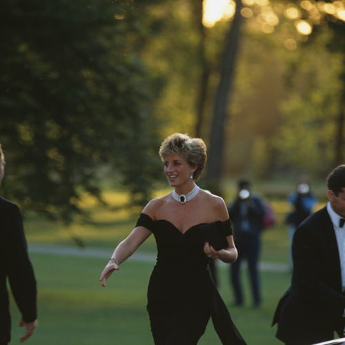 British royal Diana, Princess of Wales (1961-1997) wearing a black Christina Stambolian dress, atten...