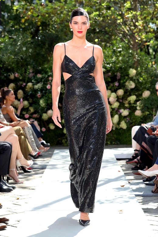 Kendall Jenner in a black cutout dress. 
