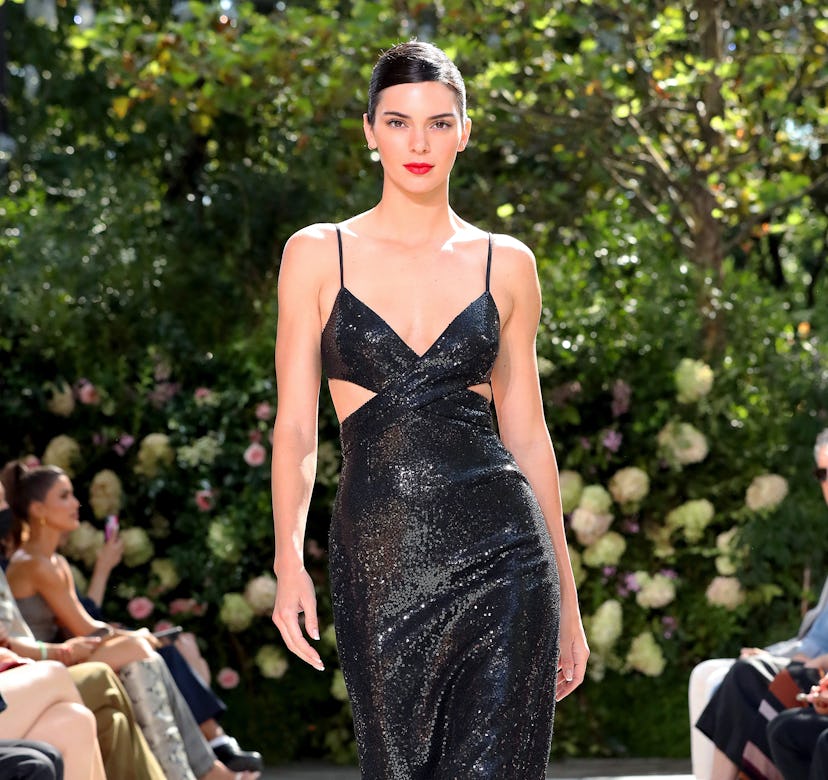 Kendall Jenner in a black cutout dress. 