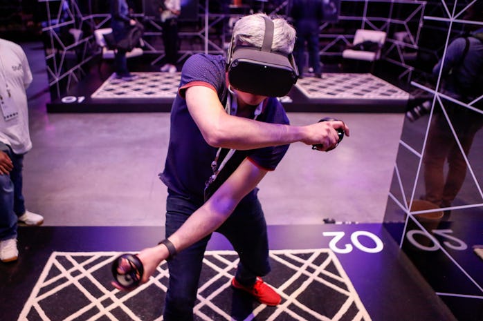 An attendee tries out the new Oculus Quest at the Facebook F8 Conference at McEnery Convention Cente...