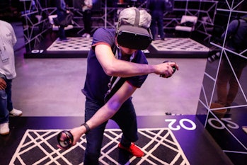 An attendee tries out the new Oculus Quest at the Facebook F8 Conference at McEnery Convention Cente...