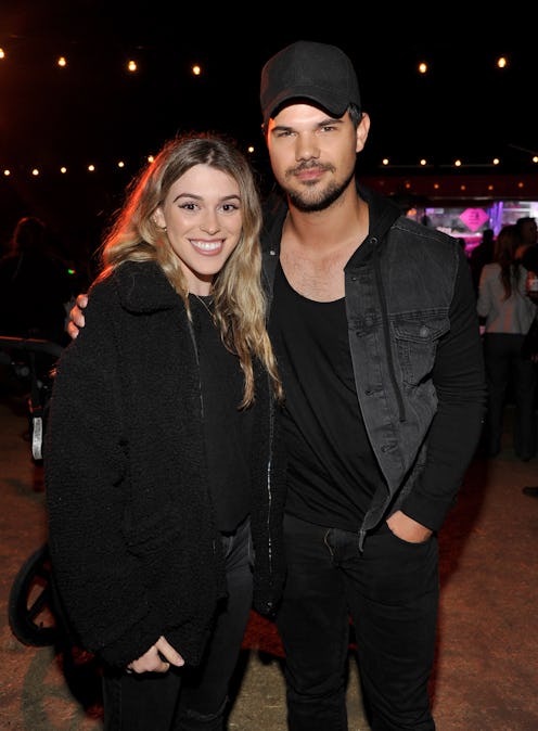 CALABASAS, CA - OCTOBER 10: Taylor Lautner (right) and guest attend the Nights of the Jack launch at...