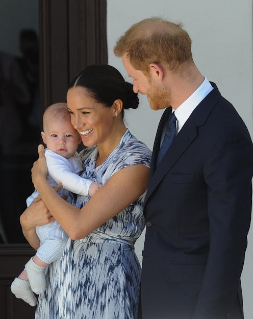 Britain's Duke and Duchess of Sussex, Prince Harry and his wife Meghan hold their baby son Archie as...