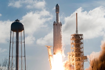 The SpaceX Falcon Heavy launches from Pad 39A at the Kennedy Space Center in Florida, on February 6,...