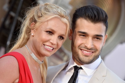 Britney Spears and Sam Asghari  smile at the premiere of 'Once Upon a Time ... in Hollywood.' (Photo...