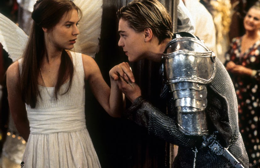 Claire Danes is surprised as Leonardo DiCaprio takes her hand to kiss in a scene from the film 'Rome...