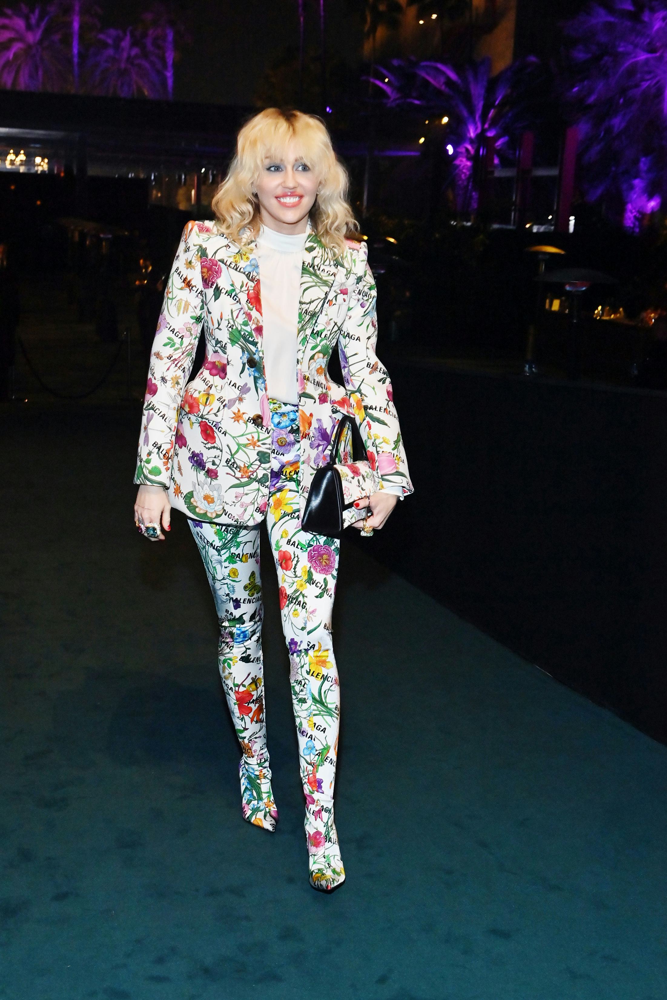 Miley Cyrus' Gucci x Balenciaga look is from the highly-anticipated Hacker Project, and is available...