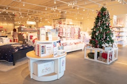 Interior image of a Pottery Barn Kids retail store decorated for the Christmas.